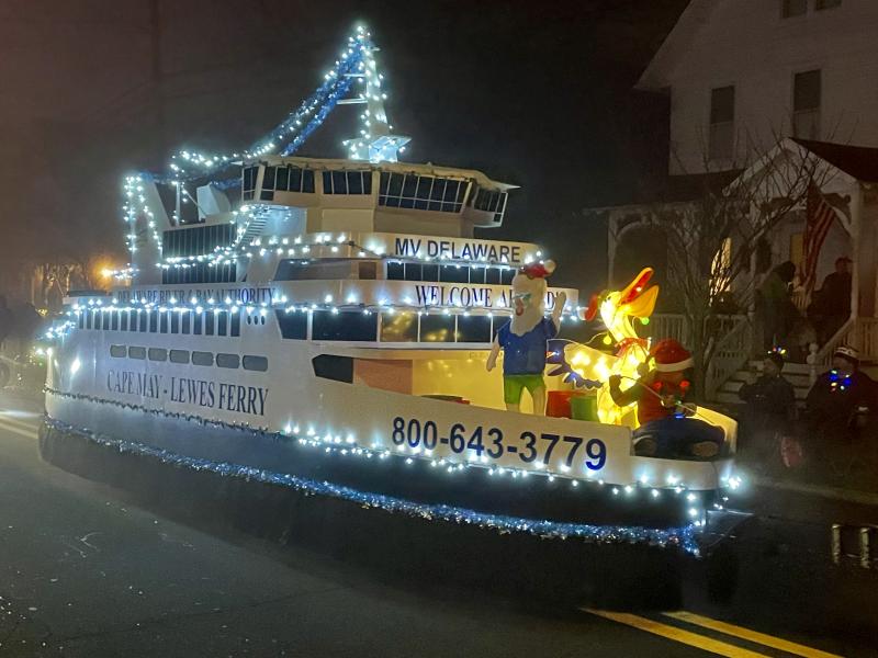 The Cape-May Lewes Ferry MV Delaware replica is covered from bow to stern in lights.